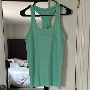 Lululemon Swiftly Tech Racerback Tank Top
Waist Length Mint Green Size 6